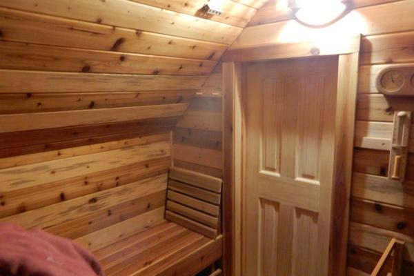 The sauna has cedar benches for relaxing